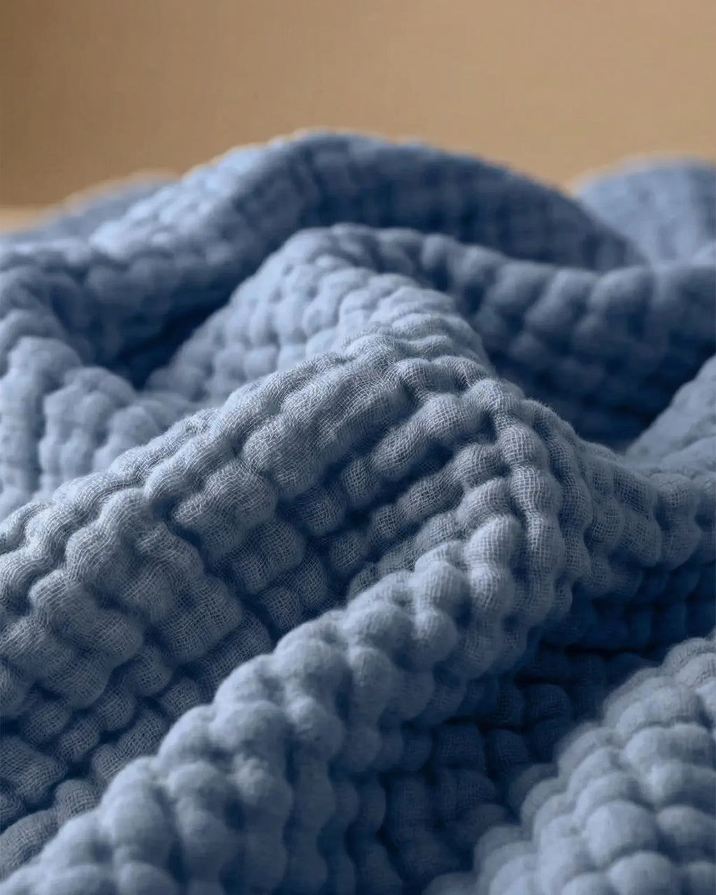 Muslin Blanket in Blue, close-up of the open cotton weave