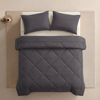 Nidora duvet in Moonstone Grey on a made bed