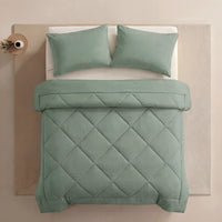 Nidora duvet in Soft Mint on a made bed