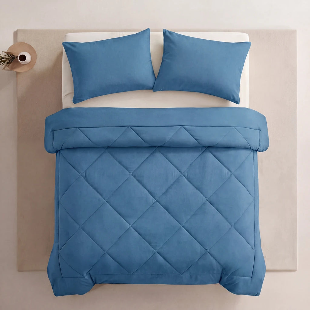 Nidora duvet in Coastal Blue on a made bed