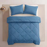 Nidora duvet in Coastal Blue on a made bed