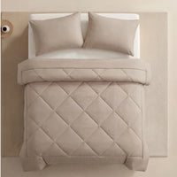 Nidora duvet in Cream Beige on a made bed